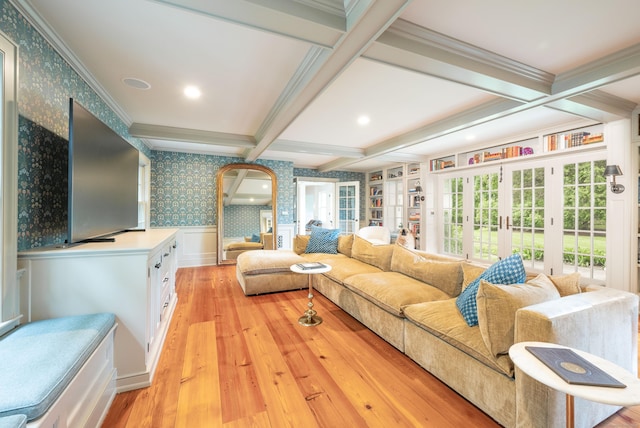 509 Main St N, Woodbury, CT 06798 - living area featuring wallpapered walls, light wood-type flooring, french doors, beam ceiling, and arched walkways