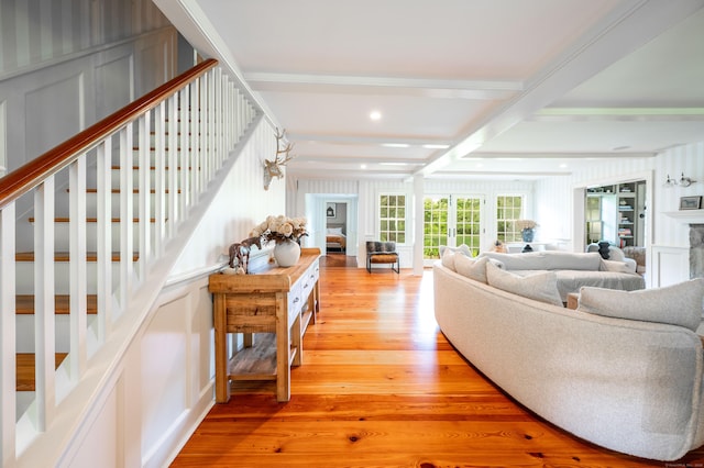 509 Main St N, Woodbury, CT 06798 - living area featuring stairs, light wood-style floors, beamed ceiling, recessed lighting, and a decorative wall
