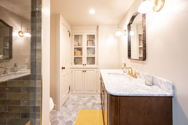 509 Main St N, Woodbury, CT 06798 - full bath featuring vanity, tile patterned floors, and tiled shower