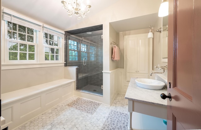 509 Main St N, Woodbury, CT 06798 - full bathroom with healthy amount of natural light, a decorative wall, vaulted ceiling, a stall shower, and vanity