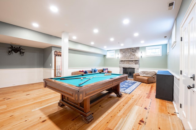 509 Main St N, Woodbury, CT 06798 - recreation room featuring wainscoting, light wood-type flooring, a stone fireplace, pool table, and recessed lighting
