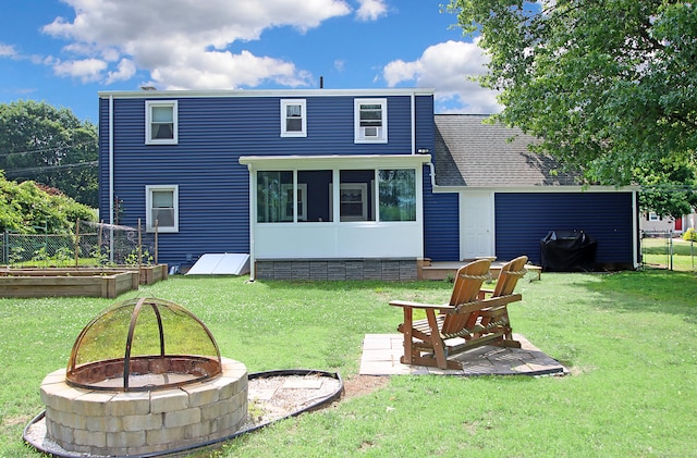 134 Valley Crest Dr, Wethersfield, CT 06109 - rear view of property featuring a fire pit and roof with shingles