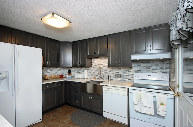 134 Valley Crest Dr, Wethersfield, CT 06109 - kitchen featuring white appliances, under cabinet range hood, light countertops, tasteful backsplash, and a textured ceiling