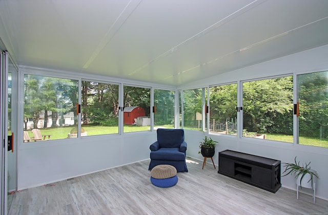 134 Valley Crest Dr, Wethersfield, CT 06109 - sunroom featuring vaulted ceiling