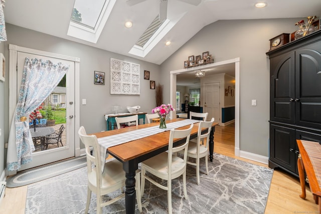 2 Bronson Rd, Prospect, CT 06712 - dining space featuring a skylight, vaulted ceiling, light wood-style flooring, ceiling fan, and recessed lighting