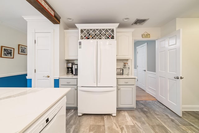 2 Bronson Rd, Prospect, CT 06712 - kitchen featuring freestanding refrigerator, ornamental molding, light countertops, and recessed lighting