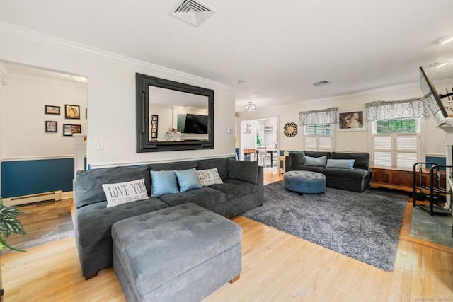 2 Bronson Rd, Prospect, CT 06712 - living room featuring crown molding, baseboard heating, and wood finished floors