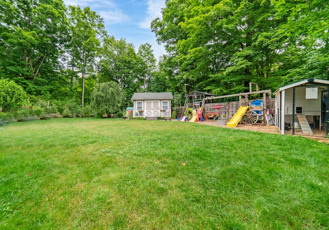 2 Bronson Rd, Prospect, CT 06712 - view of yard with a shed, a playground, and view of wooded area