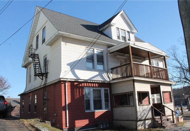 120 Linsley Ave, Meriden, CT 06451 - view of side of home featuring a balcony, entry steps, and roof with shingles