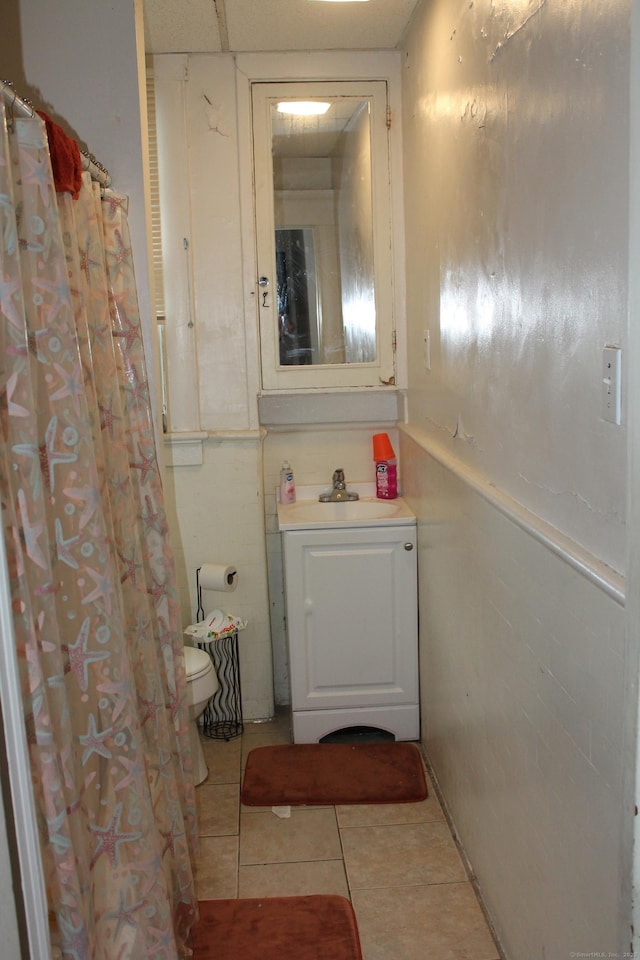 120 Linsley Ave, Meriden, CT 06451 - bathroom featuring tile patterned floors, vanity, and a shower with shower curtain