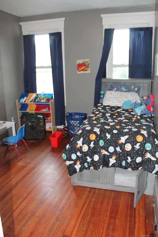 120 Linsley Ave, Meriden, CT 06451 - bedroom featuring multiple windows and wood finished floors