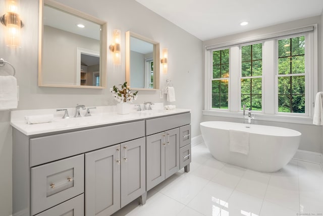 3663 Congress St, Fairfield, CT 06824 - full bathroom with double vanity, a soaking tub, tile patterned flooring, and recessed lighting