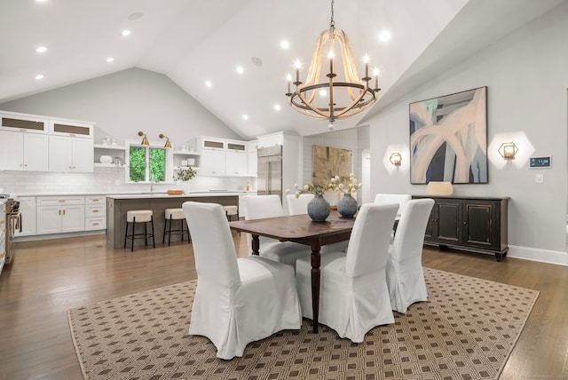 3663 Congress St, Fairfield, CT 06824 - dining space featuring a chandelier, wood finished floors, high vaulted ceiling, and recessed lighting