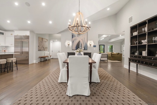 3663 Congress St, Fairfield, CT 06824 - dining space with a chandelier, dark wood-style flooring, recessed lighting, and vaulted ceiling