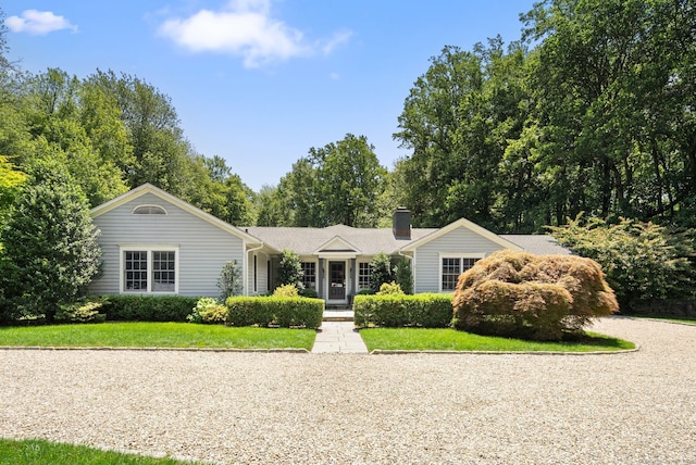 3663 Congress St, Fairfield, CT 06824 - ranch-style house with a front lawn and a chimney