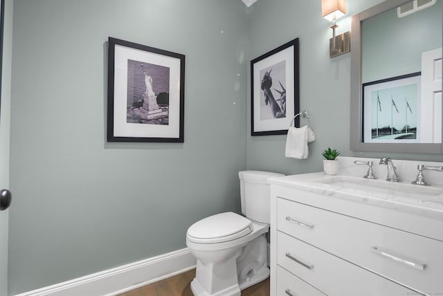3663 Congress St, Fairfield, CT 06824 - bathroom with vanity and wood finished floors