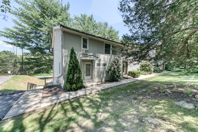 118 Sheraton Ln Unit 118, Norwich, CT 06360 - view of front of house with a front yard
