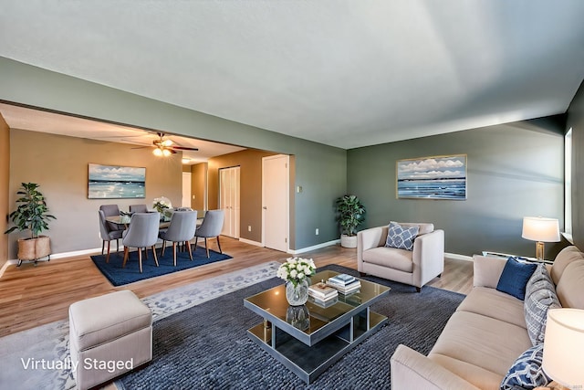 118 Sheraton Ln Unit 118, Norwich, CT 06360 - living area featuring wood finished floors and ceiling fan