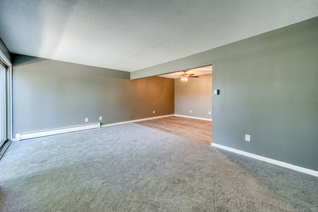 118 Sheraton Ln Unit 118, Norwich, CT 06360 - empty room with baseboard heating, carpet, a ceiling fan, and a textured ceiling