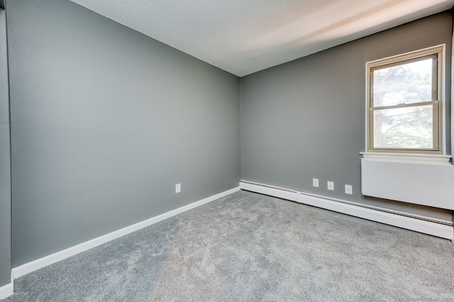 118 Sheraton Ln Unit 118, Norwich, CT 06360 - carpeted spare room featuring a baseboard heating unit and a textured ceiling