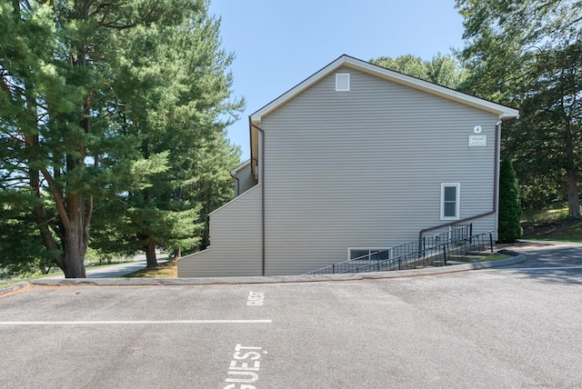 118 Sheraton Ln Unit 118, Norwich, CT 06360 - view of property exterior featuring uncovered parking