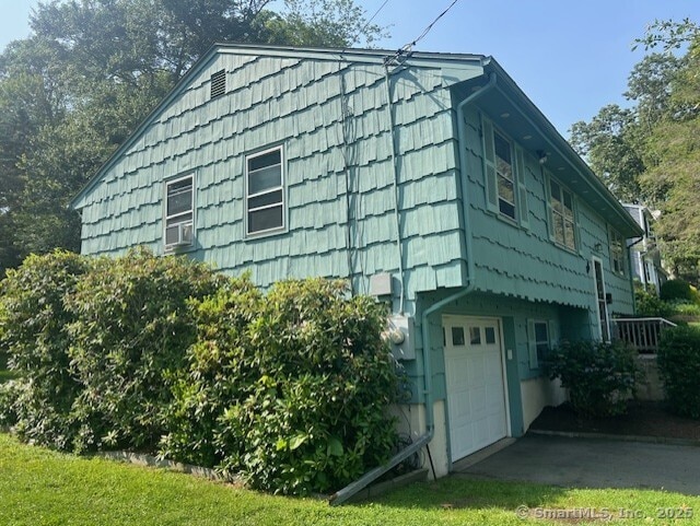 35 Corey Ln, East Lyme, CT 06357 - view of property exterior with a garage