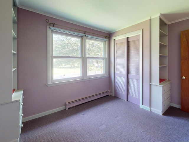 35 Corey Ln, East Lyme, CT 06357 - unfurnished bedroom featuring a baseboard heating unit, carpet, ornamental molding, and a closet