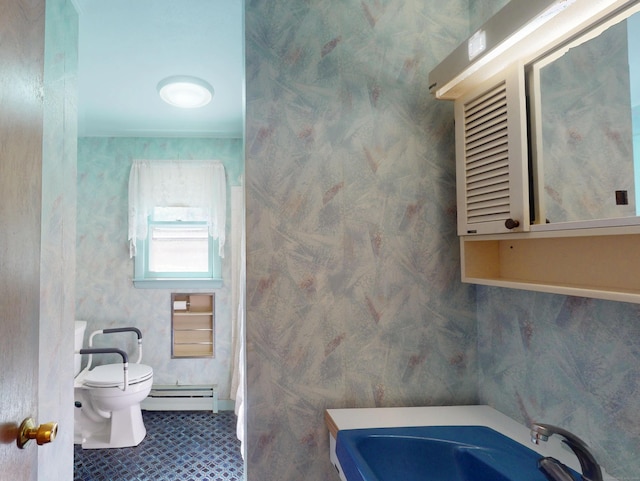 35 Corey Ln, East Lyme, CT 06357 - full bath with baseboard heating, a bath, and tile patterned floors