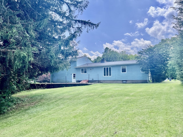 239 Bates Dr, Cheshire, CT 06410 - rear view of house with a yard