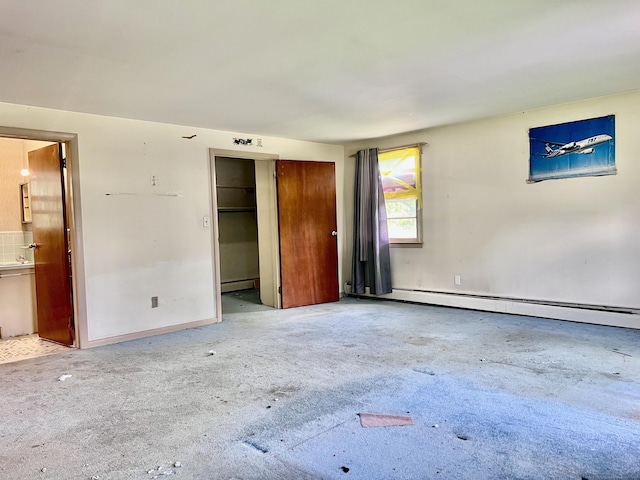239 Bates Dr, Cheshire, CT 06410 - unfurnished bedroom featuring baseboard heating and ensuite bath
