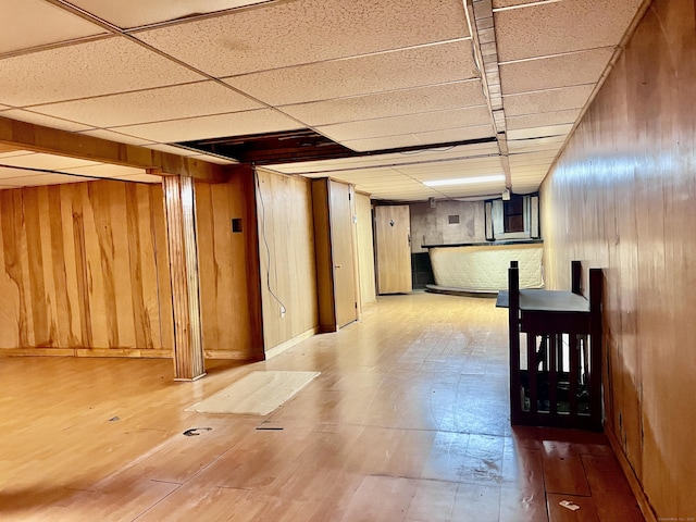 239 Bates Dr, Cheshire, CT 06410 - finished below grade area with a paneled ceiling and wood walls