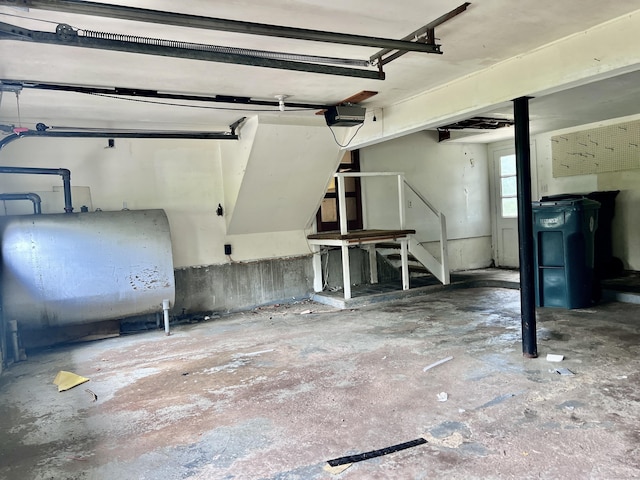 239 Bates Dr, Cheshire, CT 06410 - garage with oil tank and a garage door opener
