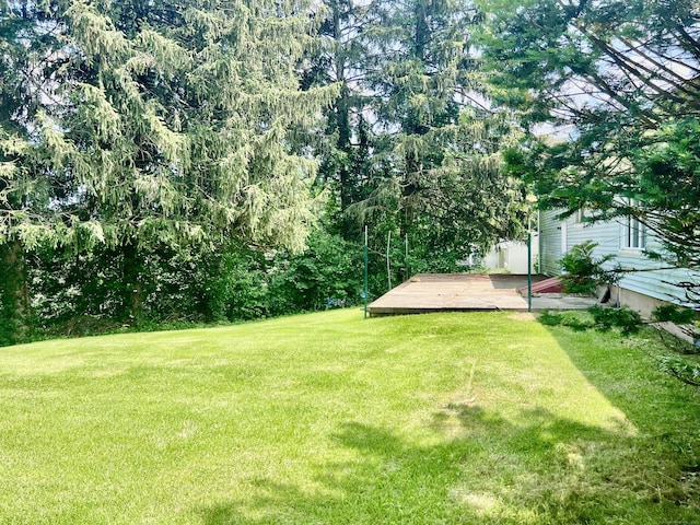239 Bates Dr, Cheshire, CT 06410 - view of grassy yard featuring a wooden deck