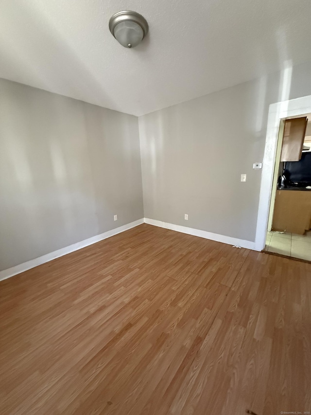 14 Market St, New Haven, CT 06513 - unfurnished room featuring light wood finished floors and baseboards