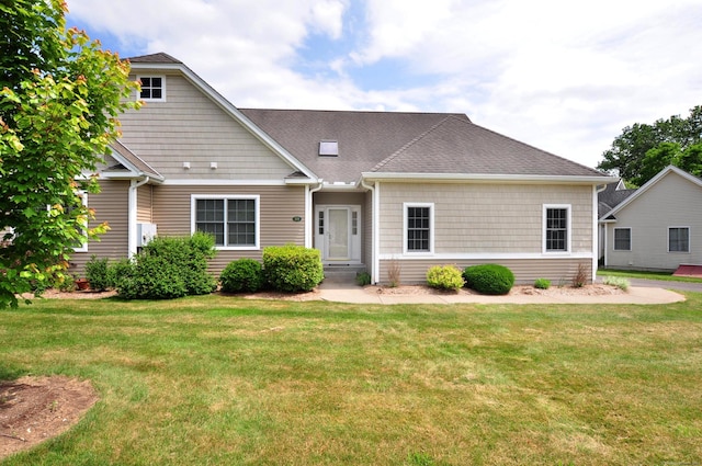 21 Hunters Rdg Unit 21, Granby, CT 06035 - view of front of property featuring a front yard and roof with shingles