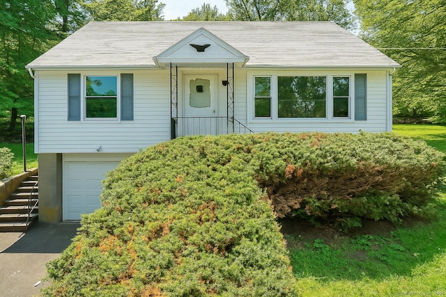 510 Sylvan Lake Rd, Watertown, CT 06779 - view of front of house featuring a garage, stairs, asphalt driveway, and roof with shingles