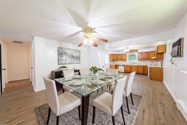 510 Sylvan Lake Rd, Watertown, CT 06779 - dining area with ceiling fan and light wood-style floors