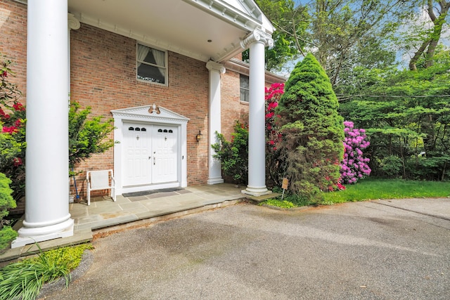 5550 Main St, Stratford, CT 06614 - entrance to property with covered porch and brick siding