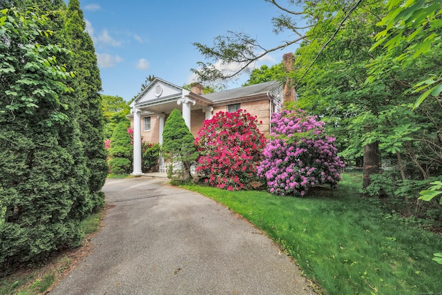 5550 Main St, Stratford, CT 06614 - greek revival house with a chimney and asphalt driveway