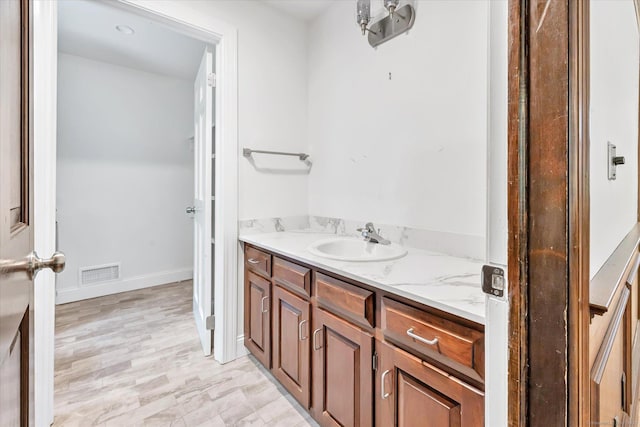 5550 Main St, Stratford, CT 06614 - bathroom featuring vanity and baseboards