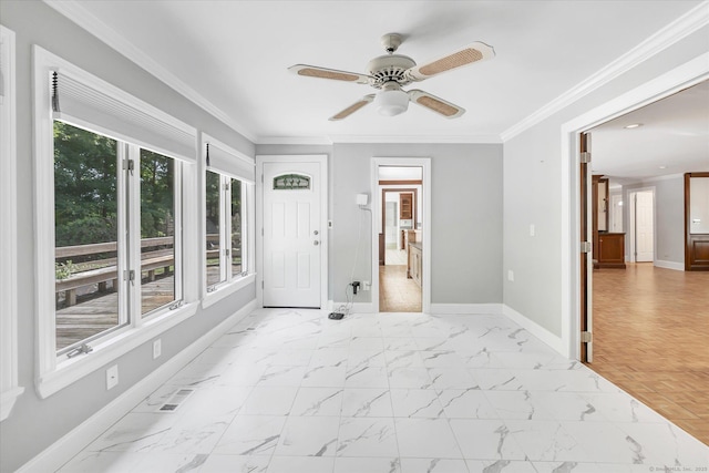5550 Main St, Stratford, CT 06614 - foyer entrance featuring ceiling fan, ornamental molding, and marble finish flooring