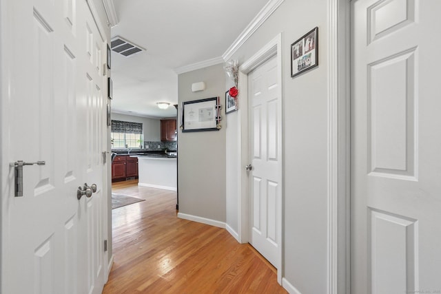 27 Riverview Ct Unit 27, Brookfield, CT 06804 - corridor featuring light wood-style flooring and ornamental molding