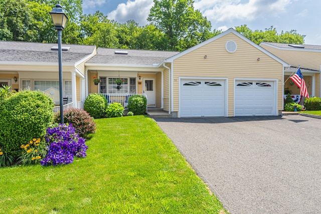 76 Highland Dr Unit 76, Monroe, CT 06468 - single story home featuring a garage, driveway, a front lawn, covered porch, and a shingled roof