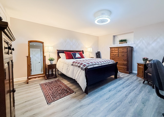 76 Highland Dr Unit 76, Monroe, CT 06468 - bedroom featuring light wood-type flooring and arched walkways