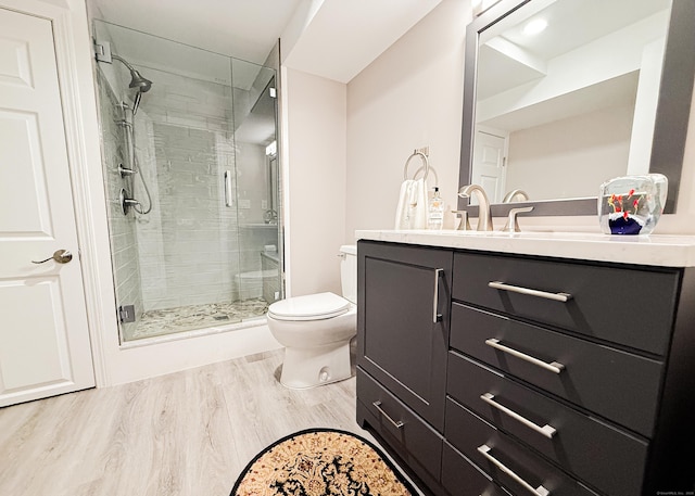 76 Highland Dr Unit 76, Monroe, CT 06468 - bathroom with vanity, a shower stall, and wood finished floors