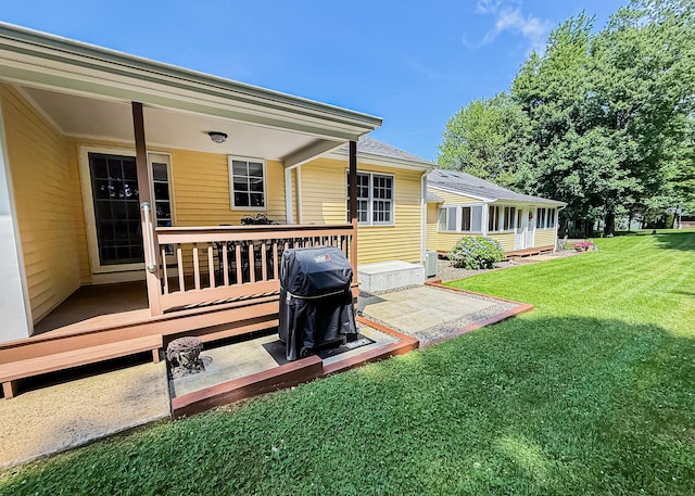 76 Highland Dr Unit 76, Monroe, CT 06468 - back of house with a deck and a lawn