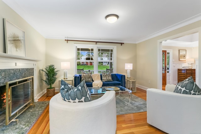 4 Reimer Rd, Westport, CT 06880 - living room featuring a fireplace, wood finished floors, and ornamental molding