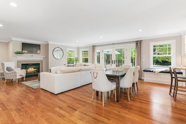 4 Reimer Rd, Westport, CT 06880 - dining room with ornamental molding, a glass covered fireplace, light wood finished floors, and recessed lighting