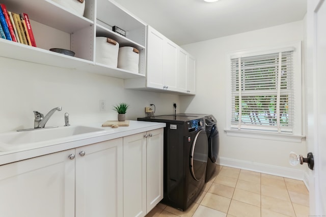 4 Reimer Rd, Westport, CT 06880 - laundry area with washer and clothes dryer, cabinet space, and light tile patterned flooring