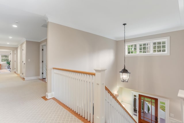 4 Reimer Rd, Westport, CT 06880 - hall with an upstairs landing, healthy amount of natural light, crown molding, light carpet, and recessed lighting
